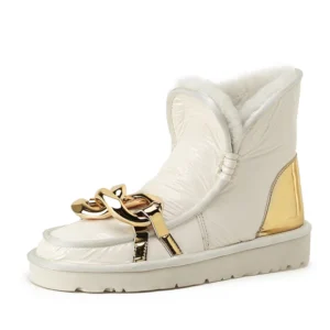 White and gold fur-lined ankle boots