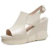 Peep toe platform wedge sandals in genuine leather