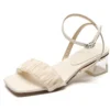 White ruffled sandals