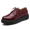 Burgundy patent leather wedge oxfords